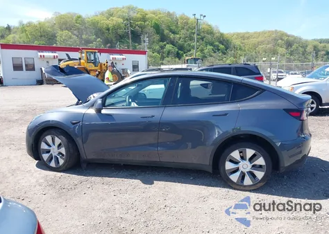 2023 Tesla Model Y Awd/Long Range Dual Motor All-Wheel Drive z USA, uszkodzony, nr VIN 7SAYGDEE8PA191415